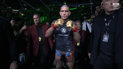 A Man Wearing A Boxing Glove That Says Ufc Live On It GIF