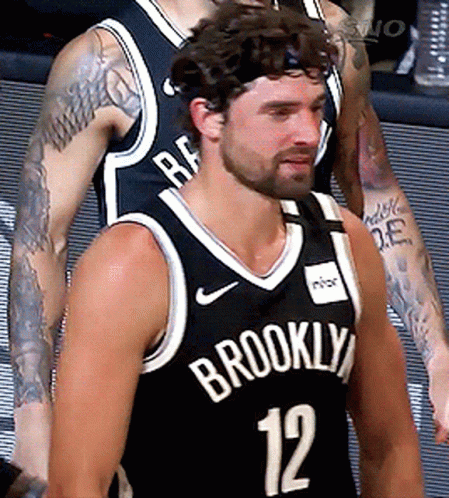 A Man Wearing A Brooklyn Jersey With The Number 12 GIF