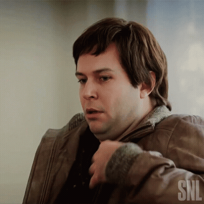 A Man Wearing A Brown Leather Jacket With The Snl Logo On The Bottom GIF