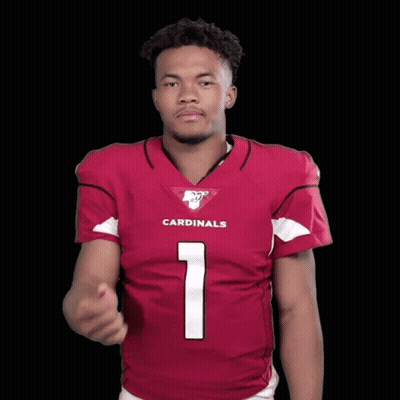 A Man Wearing A Cardinals Jersey Points Up GIF