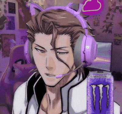 A Man Wearing A Cat Ear Headset Is Next To A Monster Energy Drink GIF