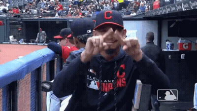 A Man Wearing A Cleveland Indians Sweatshirt Makes A Funny Face GIF