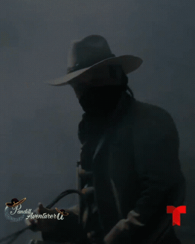 A Man Wearing A Cowboy Hat And A Bandana Is Featured On A Poster For Sandily Adventures GIF