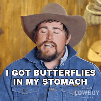 A Man Wearing A Cowboy Hat And Denim Jacket Says I Got Butterflies In My Stomach GIF