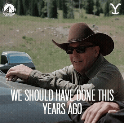 A Man Wearing A Cowboy Hat And Sunglasses Is Sitting In A Car With The Words We Should Have Done This Years Ago GIF