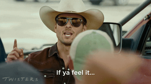 A Man Wearing A Cowboy Hat And Sunglasses Says " If Ya Feel It " GIF