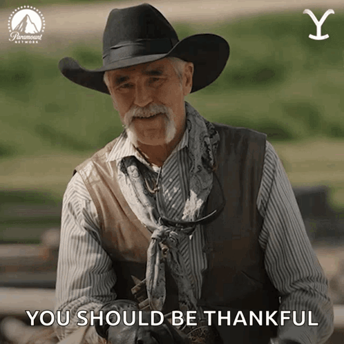 A Man Wearing A Cowboy Hat And Vest Says You Should Be Thankful GIF