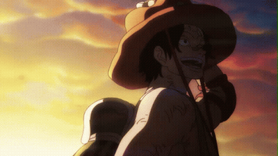 A Man Wearing A Cowboy Hat Looks At The Sunset GIF