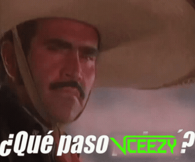 A Man Wearing A Cowboy Hat Says " Qué Paso " In Green Letters GIF