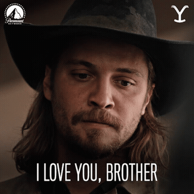 A Man Wearing A Cowboy Hat With The Words I Love You Brother Below Him GIF