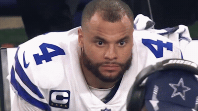 A Man Wearing A Cowboys Uniform With The Number 4 On It GIF