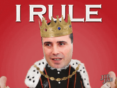 A Man Wearing A Crown And A King 'S Robe With The Word I Rule Above Him GIF