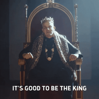 A Man Wearing A Crown Is Sitting On A Throne With The Words It 'S Good To Be The King Above Him GIF