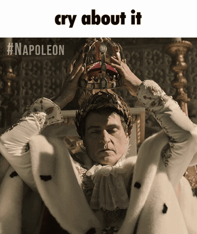 A Man Wearing A Crown With The Words Cry About It Written Below Him GIF