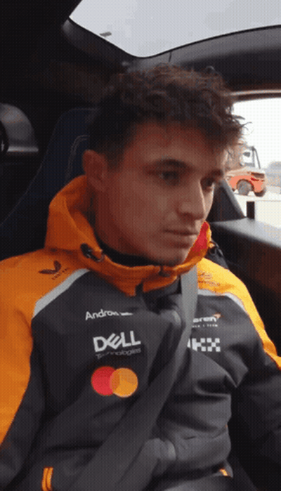 A Man Wearing A Dell Jacket Sits In A Car Seat GIF