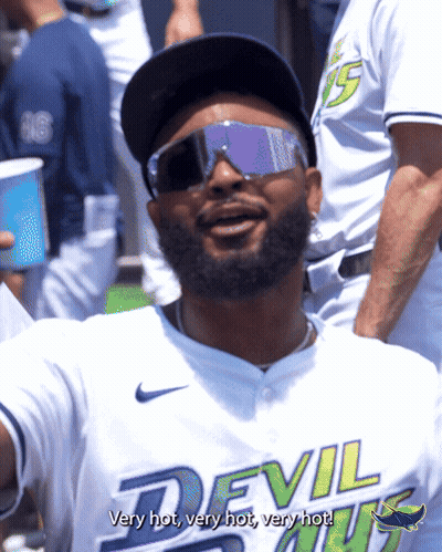 A Man Wearing A Devils Jersey And Sunglasses Says Very Hot Very Hot Very Hot GIF