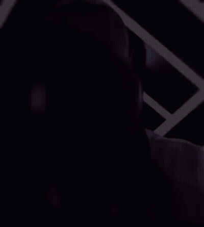 A Man Wearing A Dodgers Jersey Is Covering His Face GIF