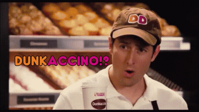 A Man Wearing A Dunkin Donuts Hat Is Holding A Cup GIF