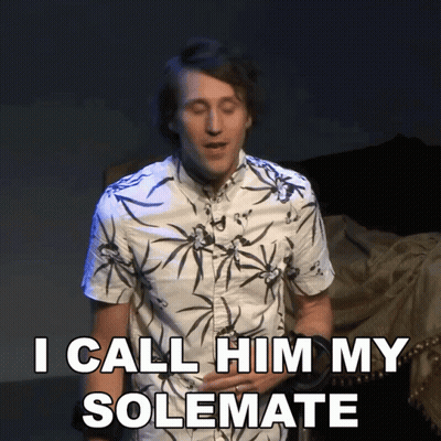 A Man Wearing A Floral Shirt Says I Call Him My Solemate GIF