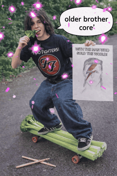 A Man Wearing A Foo Fighters Shirt Is Riding A Skateboard GIF