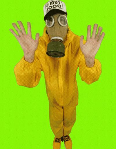 A Man Wearing A Gas Mask And A Hat That Says Muy Loco On It GIF