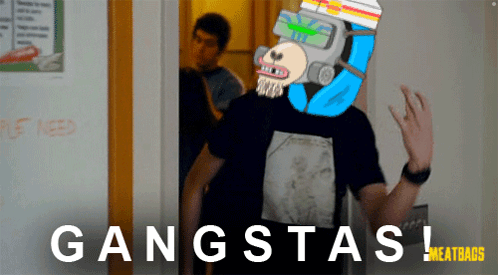 A Man Wearing A Gas Mask Stands In Front Of A Door With The Words Gangsta Written On It GIF