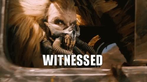 A Man Wearing A Gas Mask With The Word Witnessed Written Below Him GIF