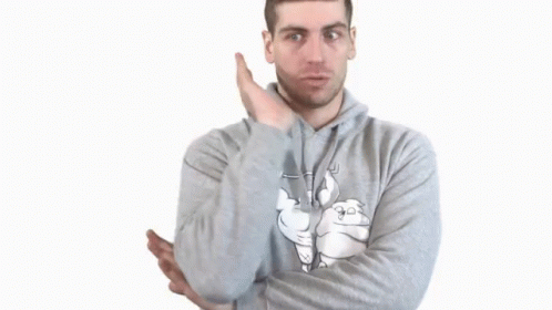 A Man Wearing A Gray Hoodie With A Cartoon Bear On It GIF