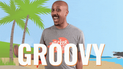 A Man Wearing A Gray Shirt That Says Groovy On It GIF