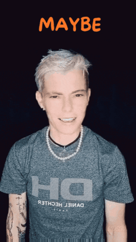 A Man Wearing A Gray Shirt That Says Ho On It GIF