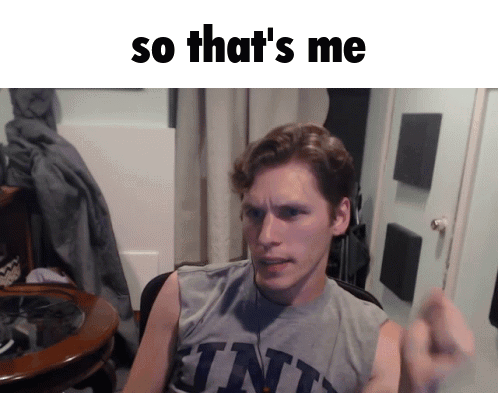 A Man Wearing A Gray Tank Top With The Word Tnt On The Front GIF