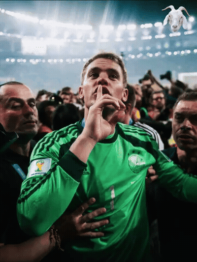 A Man Wearing A Green Adidas Jersey Holds His Finger To His Mouth GIF