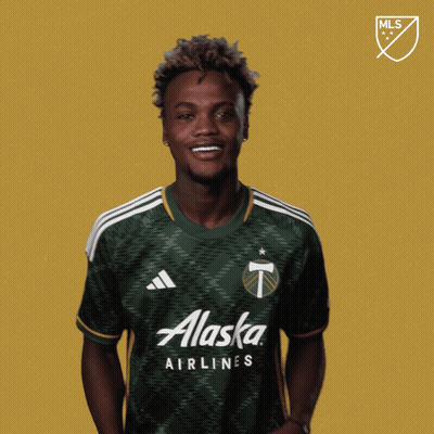 A Man Wearing A Green Adidas Jersey Says " Vamos " GIF