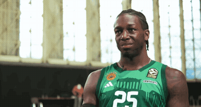 A Man Wearing A Green Adidas Jersey With The Number 25 On It GIF
