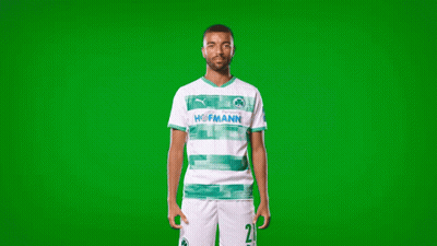 A Man Wearing A Green And White Hofmann Shirt GIF