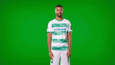 A Man Wearing A Green And White Hofmann Shirt GIF