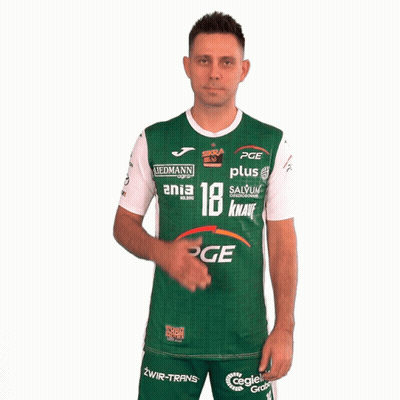 A Man Wearing A Green And White Pge Shirt Holds His Hand To His Chest GIF