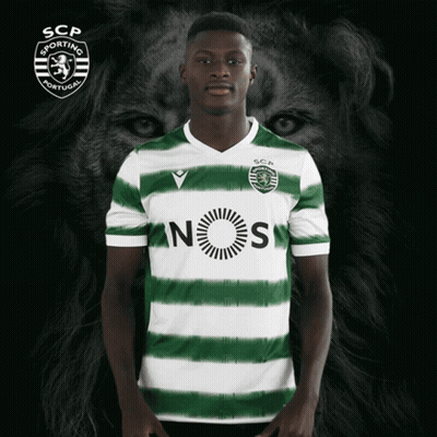 A Man Wearing A Green And White Striped Shirt That Says Nos On It GIF