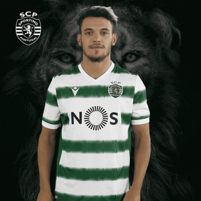 A Man Wearing A Green And White Striped Shirt That Says Scp Sporting Portugal GIF