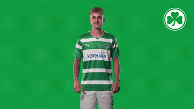 A Man Wearing A Green And White Striped Shirt With The Word Hofmann On It GIF