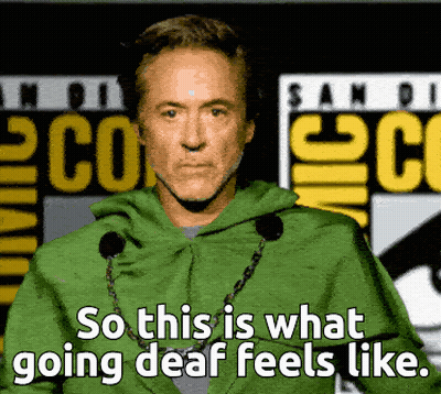 A Man Wearing A Green Cape Says So This Is What Going Deaf Feels Like GIF