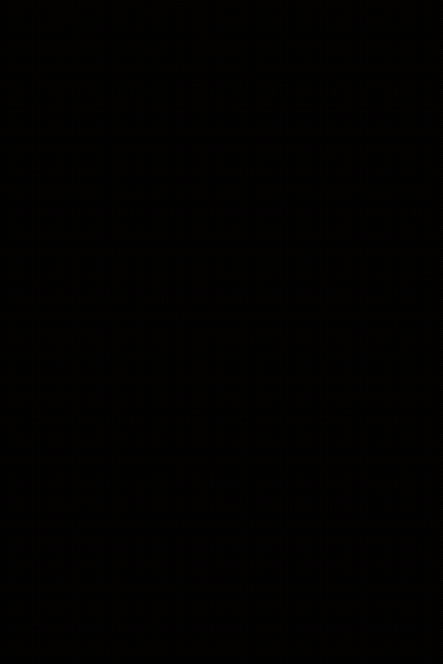 A Man Wearing A Green Hat With A White L On It GIF