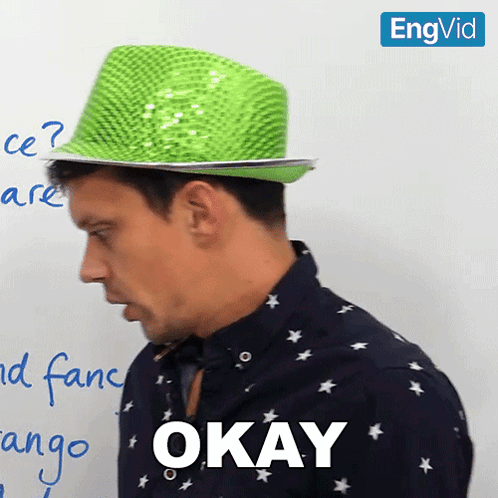 Green Hat Man Says Okay GIF