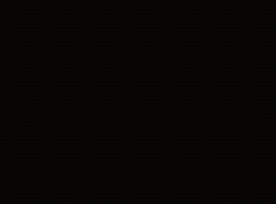 A Man Wearing A Green Helmet And Ear Buds Looks At The Camera GIF