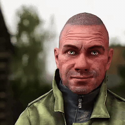 A Man Wearing A Green Jacket And A Black Turtleneck Is Looking At The Camera . GIF