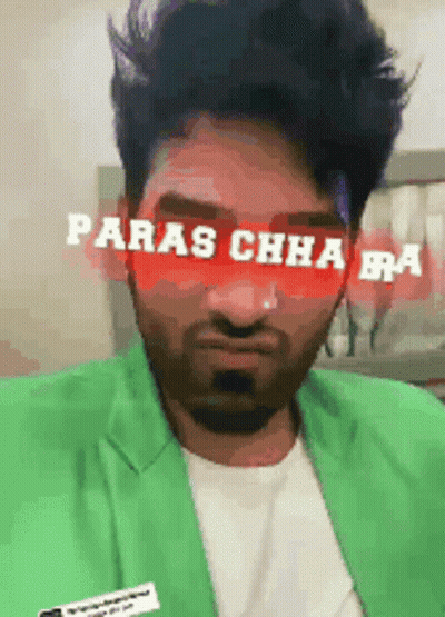 A Man Wearing A Green Jacket Has The Words Paras Chha Bra Written On His Face GIF