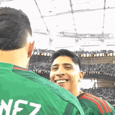 A Man Wearing A Green Jersey With Nfz On The Back GIF