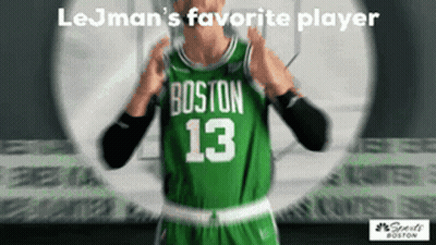 A Man Wearing A Green Jersey With The Number 13 GIF