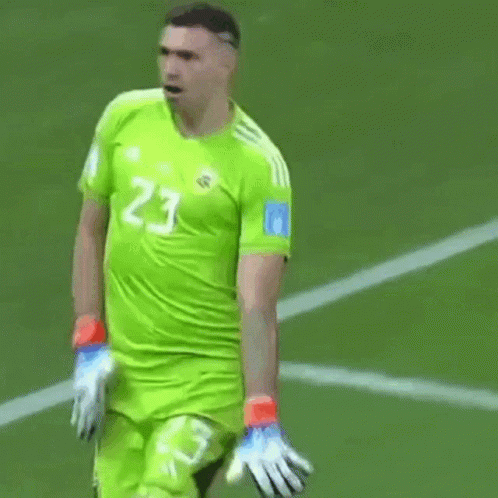 A Man Wearing A Green Jersey With The Number 23 On It GIF