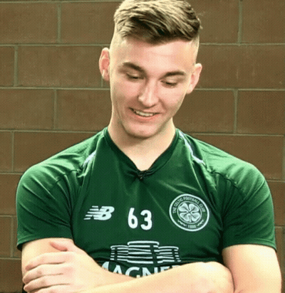 A Man Wearing A Green Jersey With The Number 63 GIF